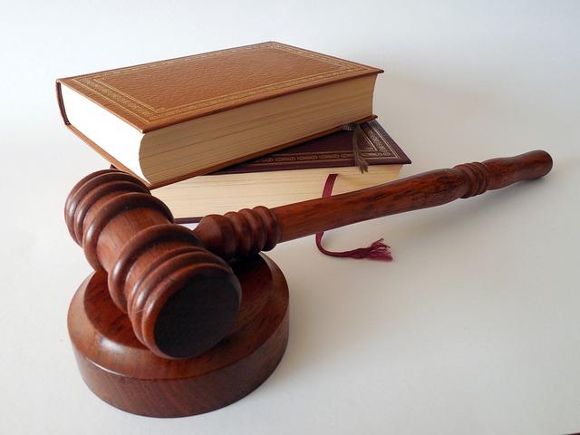 A judge's gavel and books, representing the legal system. Relevant to serving court papers in Colorado